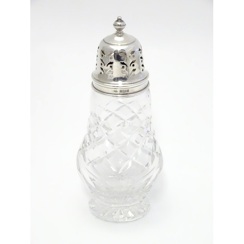 367 - A silver mounted cut glass sugar sifter. Hallmarked Birmingham 1960 maker Adie Bros Ltd.  6