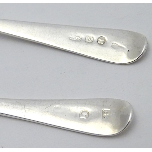 370 - Two Geo III silver teaspoons with shell formed bowls and bright cut decoration to handles. one hallm... 