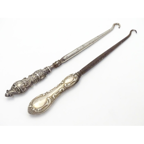 371 - Two silver-handled lace / button hooks. Hallmarked Birmingham 1906 maker Adie & Lovekin Ltd and Birm... 