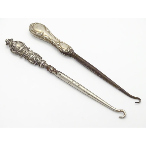 371 - Two silver-handled lace / button hooks. Hallmarked Birmingham 1906 maker Adie & Lovekin Ltd and Birm... 