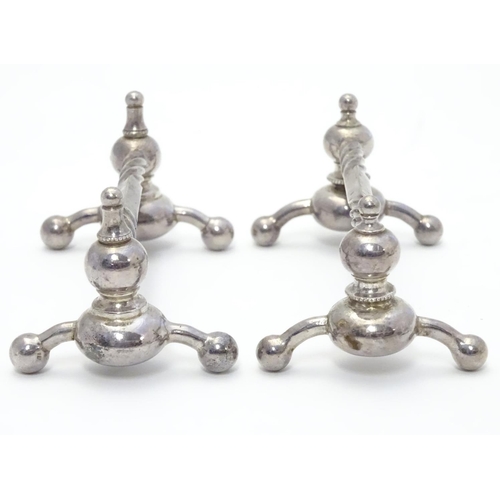 372 - A pair of silver plate knife rests. 4