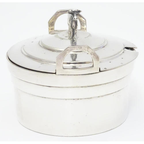 379 - A silver plate butter dish of circular form with glass liner, the lid with cow formed finial. 4