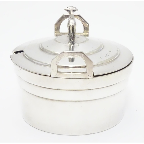 379 - A silver plate butter dish of circular form with glass liner, the lid with cow formed finial. 4