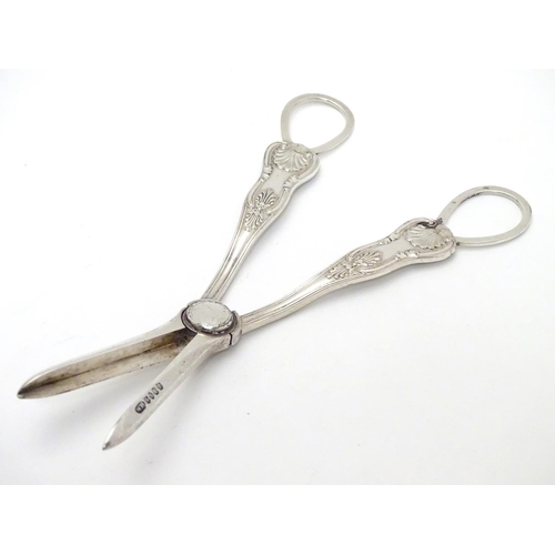 401 - Assorted 19thC and later items to include silver plate grape shears, close plate wick trimmers, and ... 