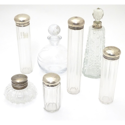 415 - Assorted glass dressing table bottles/ vanity jars, scent bottles etc  to include 4 jars with silver... 