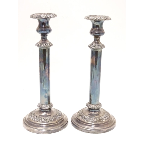 423 - A pair of silver plate candlesticks Approx. 12