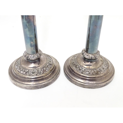 423 - A pair of silver plate candlesticks Approx. 12