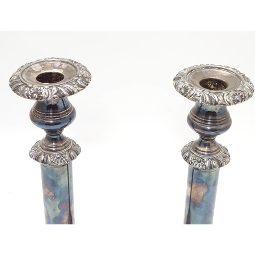 423 - A pair of silver plate candlesticks Approx. 12