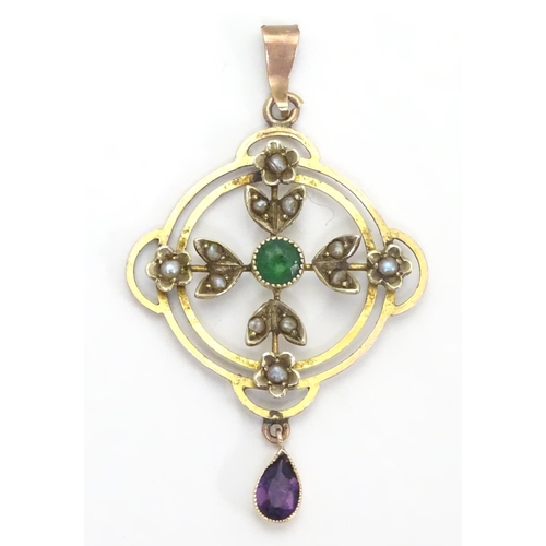 470 - A 9ct gold pendant of Edwardian suffragette manner, set with green violet and white seed pearls. The... 