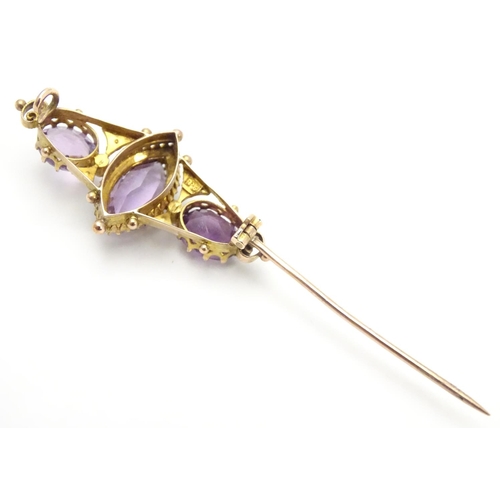 473 - A Victorian brooch set with facet cut amethyst and seed pearls 1 1/2