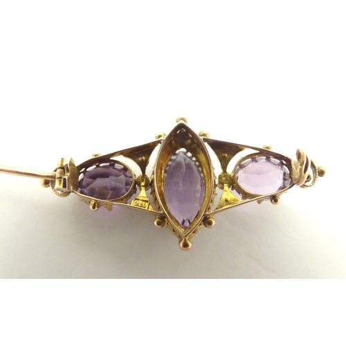 473 - A Victorian brooch set with facet cut amethyst and seed pearls 1 1/2