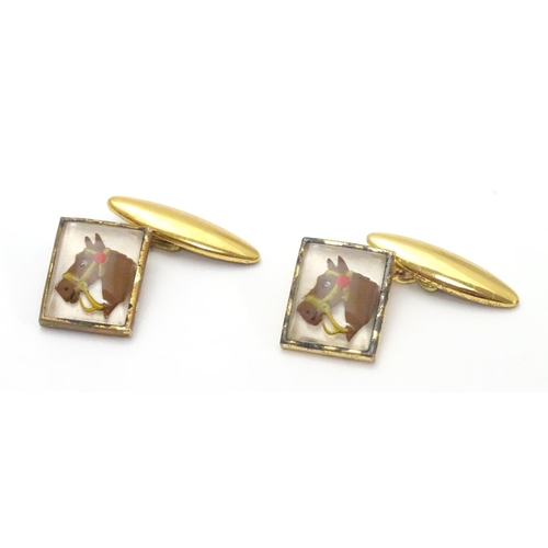 478 - Gilt plated cufflinks with essex crystal style cabochon decoration depicting horse heads.