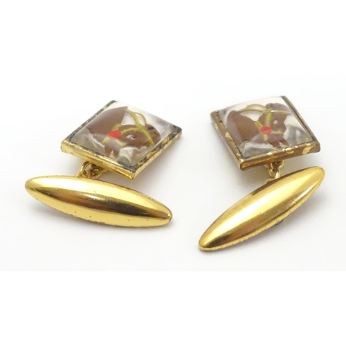 478 - Gilt plated cufflinks with essex crystal style cabochon decoration depicting horse heads.