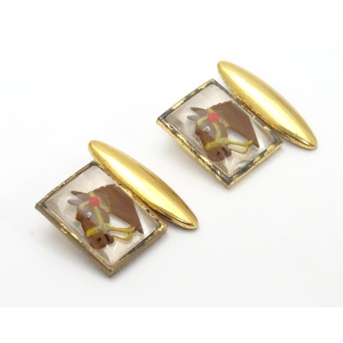 478 - Gilt plated cufflinks with essex crystal style cabochon decoration depicting horse heads.