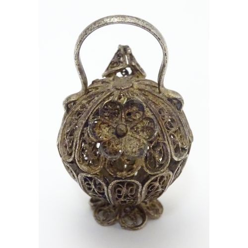 508 - A white metal pendant / model formed as a filigree jar / vessel. Approx 1 /2