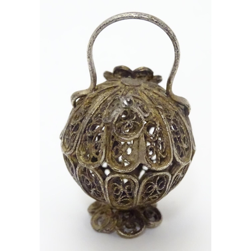 508 - A white metal pendant / model formed as a filigree jar / vessel. Approx 1 /2