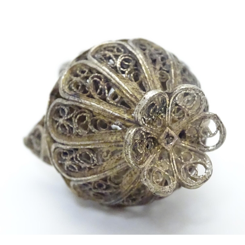 508 - A white metal pendant / model formed as a filigree jar / vessel. Approx 1 /2