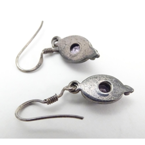 514 - A silver and amethyst suite of jewellery comprising necklace bracket and earrings