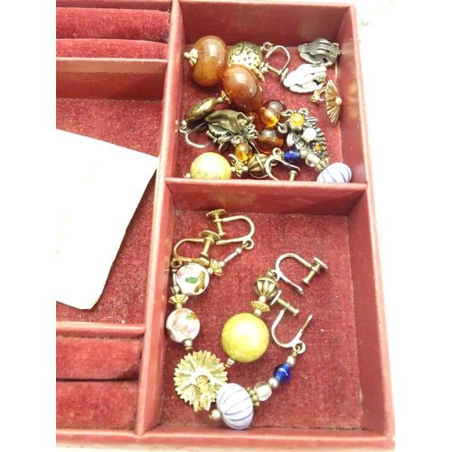 543 - A quantity of assorted costume jewellery  to include brooches, earrings, necklaces etc together with... 