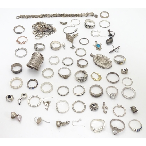 548 - Assorted silver jewellery to include rings, earrings, pendant bracket etc. Some silver examples.