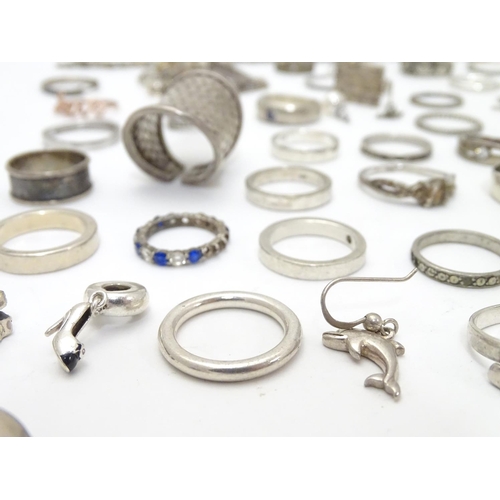 548 - Assorted silver jewellery to include rings, earrings, pendant bracket etc. Some silver examples.