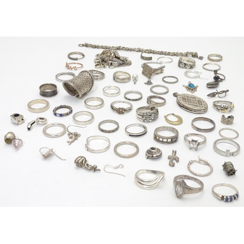 548 - Assorted silver jewellery to include rings, earrings, pendant bracket etc. Some silver examples.