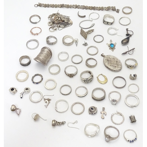 548 - Assorted silver jewellery to include rings, earrings, pendant bracket etc. Some silver examples.