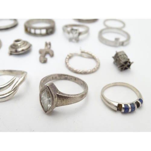 548 - Assorted silver jewellery to include rings, earrings, pendant bracket etc. Some silver examples.