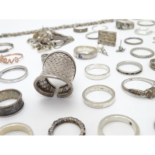 548 - Assorted silver jewellery to include rings, earrings, pendant bracket etc. Some silver examples.