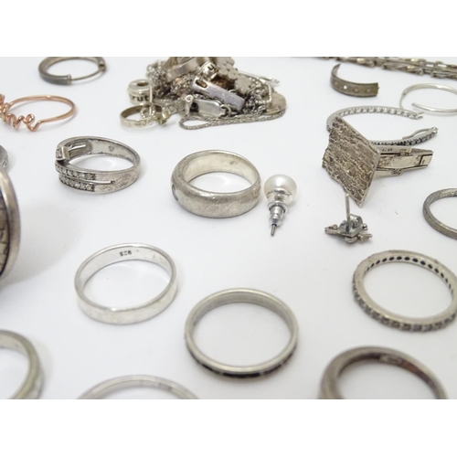 548 - Assorted silver jewellery to include rings, earrings, pendant bracket etc. Some silver examples.