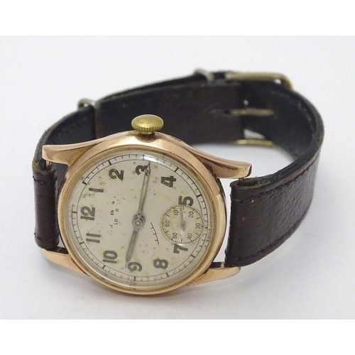 557 - An early 20thC J W Benson , London wrist watch, with Audemars movement and 9ct gold case.