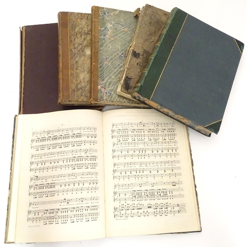 634 - A large quantity of bound 19thC sheet music in six volumes, arranged for piano, including popular mu... 