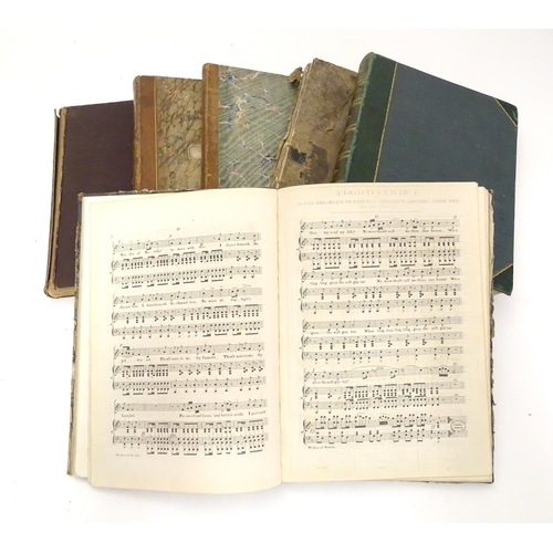 634 - A large quantity of bound 19thC sheet music in six volumes, arranged for piano, including popular mu... 