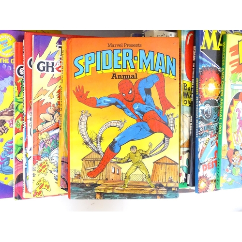 638 - Books: a large collection of 1970s 1980s 1990s comic book annuals, to include Bananaman, Thundercats... 