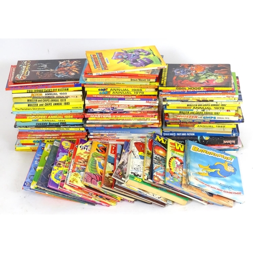 638 - Books: a large collection of 1970s 1980s 1990s comic book annuals, to include Bananaman, Thundercats... 