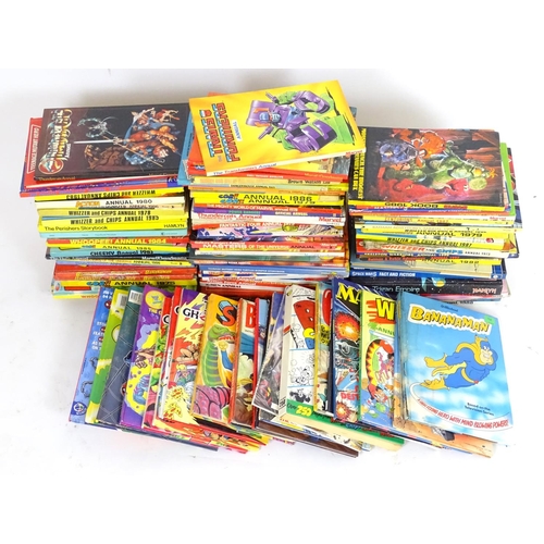 638 - Books: a large collection of 1970s 1980s 1990s comic book annuals, to include Bananaman, Thundercats... 