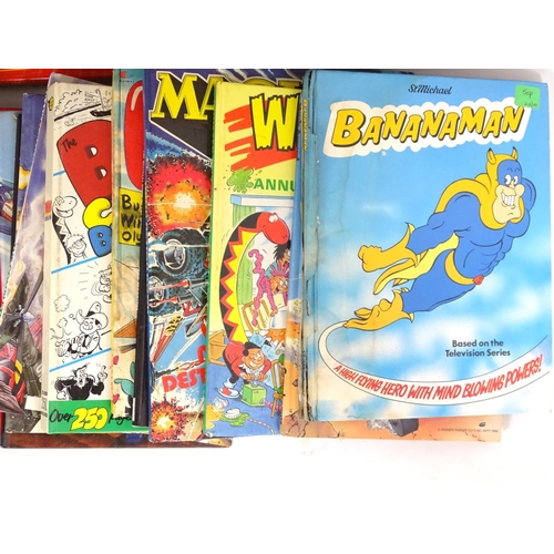 638 - Books: a large collection of 1970s 1980s 1990s comic book annuals, to include Bananaman, Thundercats... 