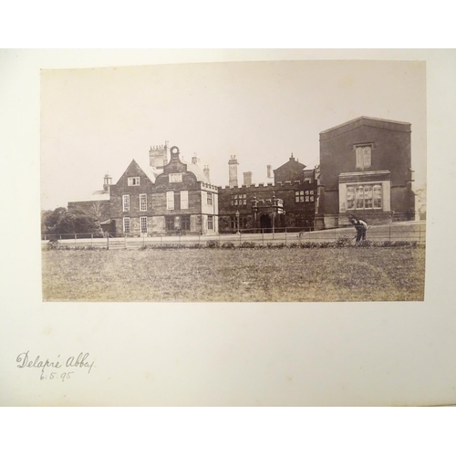 649 - A Victorian photograph album, containing numerous monochrome photographs of Northamptonshire landmar... 