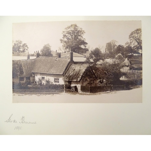 649 - A Victorian photograph album, containing numerous monochrome photographs of Northamptonshire landmar... 