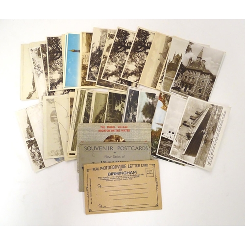 669 - A collection of early 20thC postcards, depicting scenes at Rhyl, Swansea, Bourneville, Edinburgh, Br... 