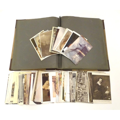 670 - An early 20thC photograph album, together with a collection of photographs and postcards depicting E... 