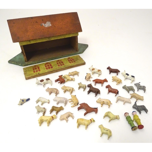 694 - Toy: A late 19th / early 20thC wooden Noah's Ark with polychrome decoration. The flat bottomed ark w... 