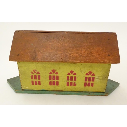 694 - Toy: A late 19th / early 20thC wooden Noah's Ark with polychrome decoration. The flat bottomed ark w... 