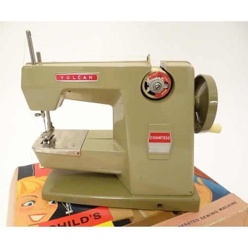 698 - Toy: A 20thC Vulcan Countess child's sewing machine, hand operated. With original box and instructio... 