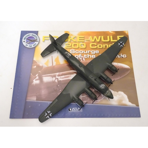 699 - Toys: Three scale models of German WWII military planes / aircraft, comprising Focke Wulf 200C Condo... 