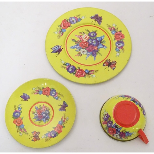 708 - Toys: A mid 20thC Chad Valley tinplate tea set in bright yellow decorated with sprays of flowers and... 