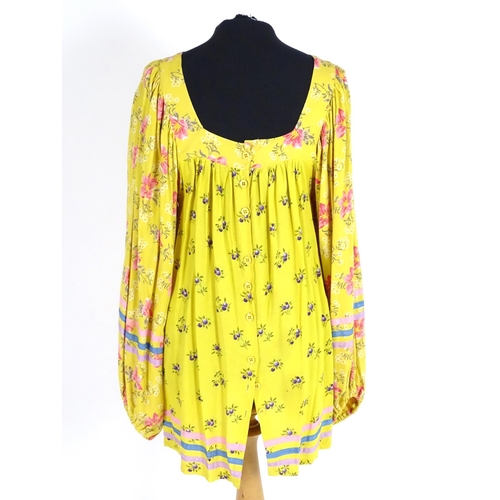 716 - A vintage Jeff Banks, London, smock top in a mustard colour, c1980's. Bust size 38