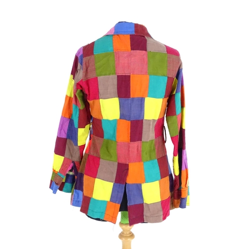 719 - A vintage multi coloured patchwork blouse/shirt with  patch pockets and belt loop. Bust size 32