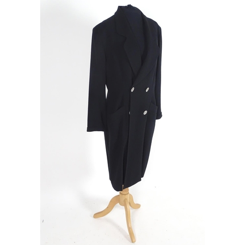 721 - A ladies Jaegar black wool double breasted jacket. Bust size approx 37