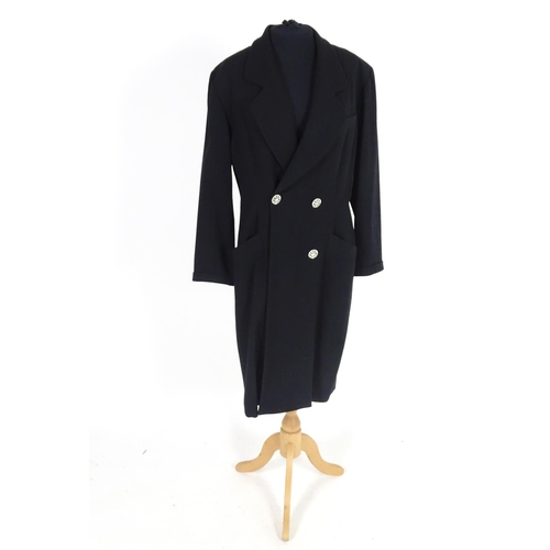 721 - A ladies Jaegar black wool double breasted jacket. Bust size approx 37